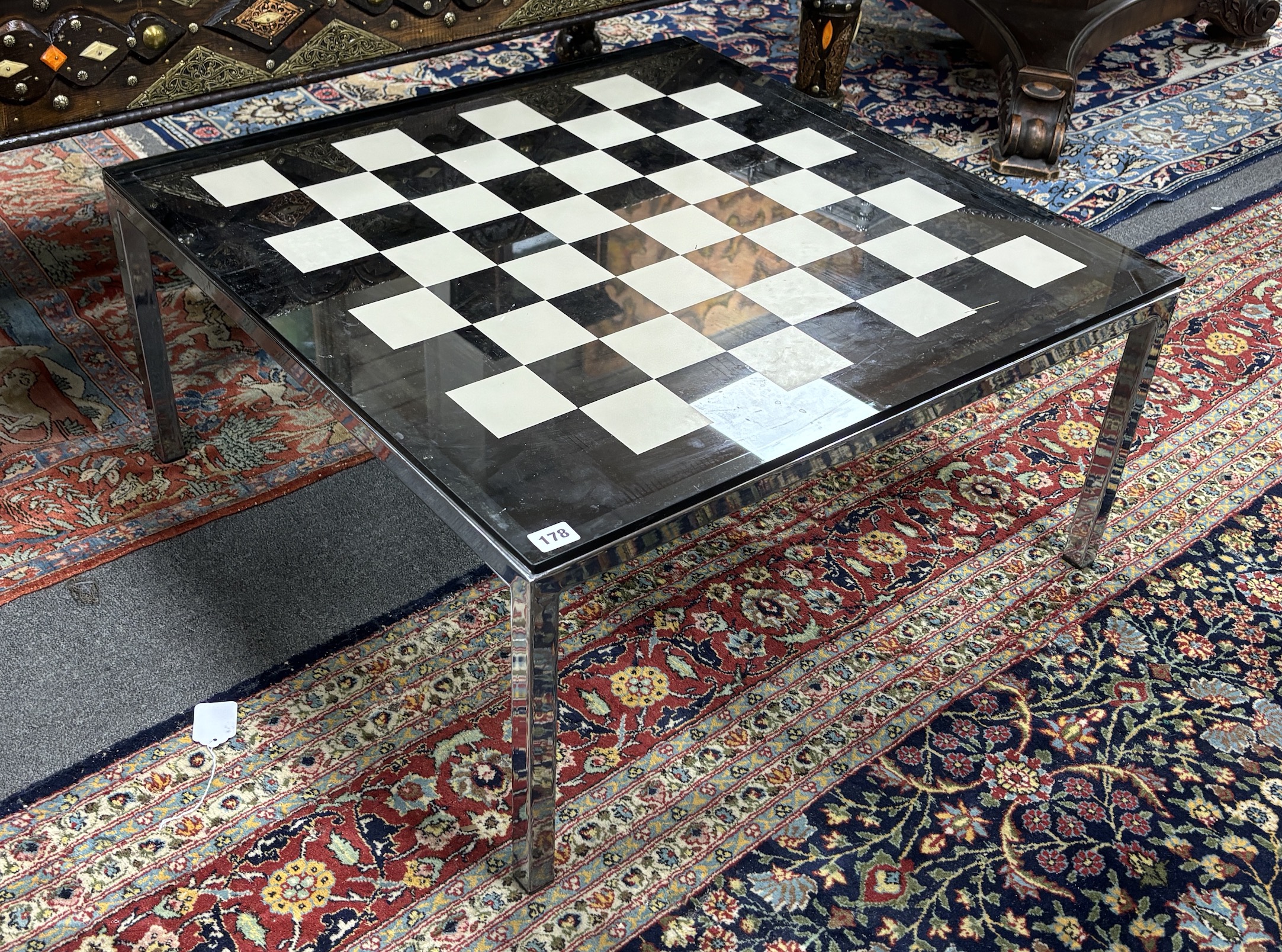A 20th century square glass and chrome low games table, width 74cm, height 35cm